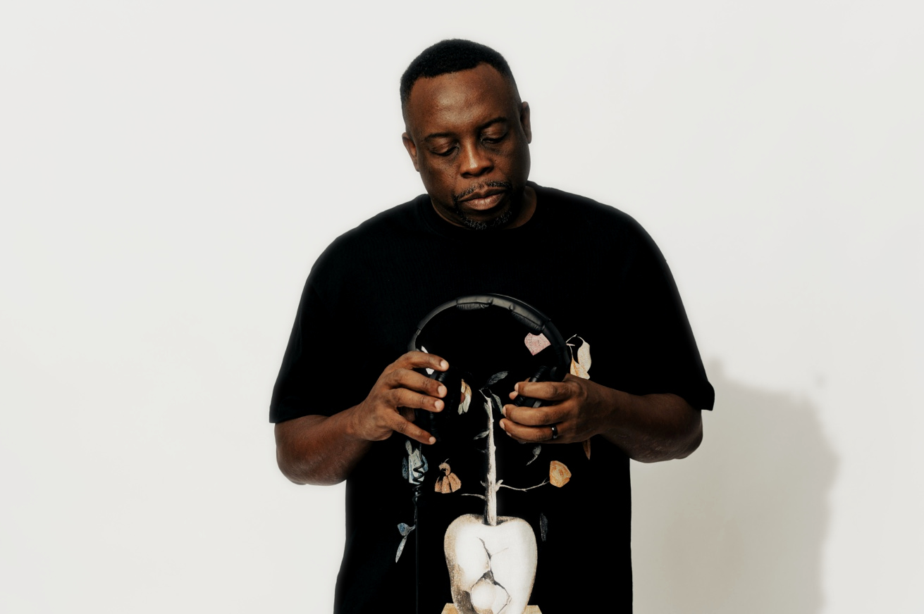 Mix Master David with headphones